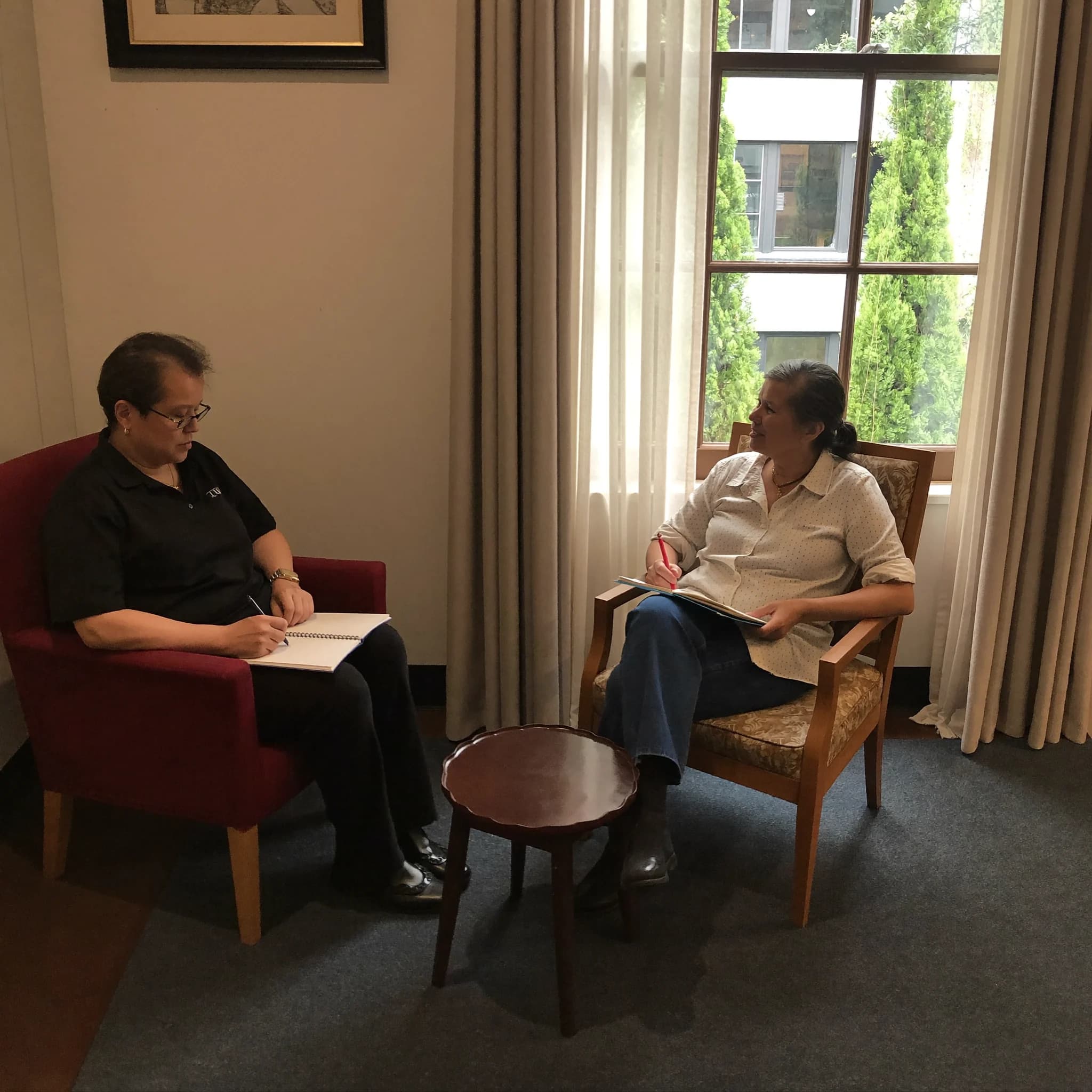 Psychosociale begeleiding in een rustig gesprek over spanning en dagelijks functioneren